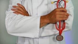 Close up of doctor holding a stethoscope