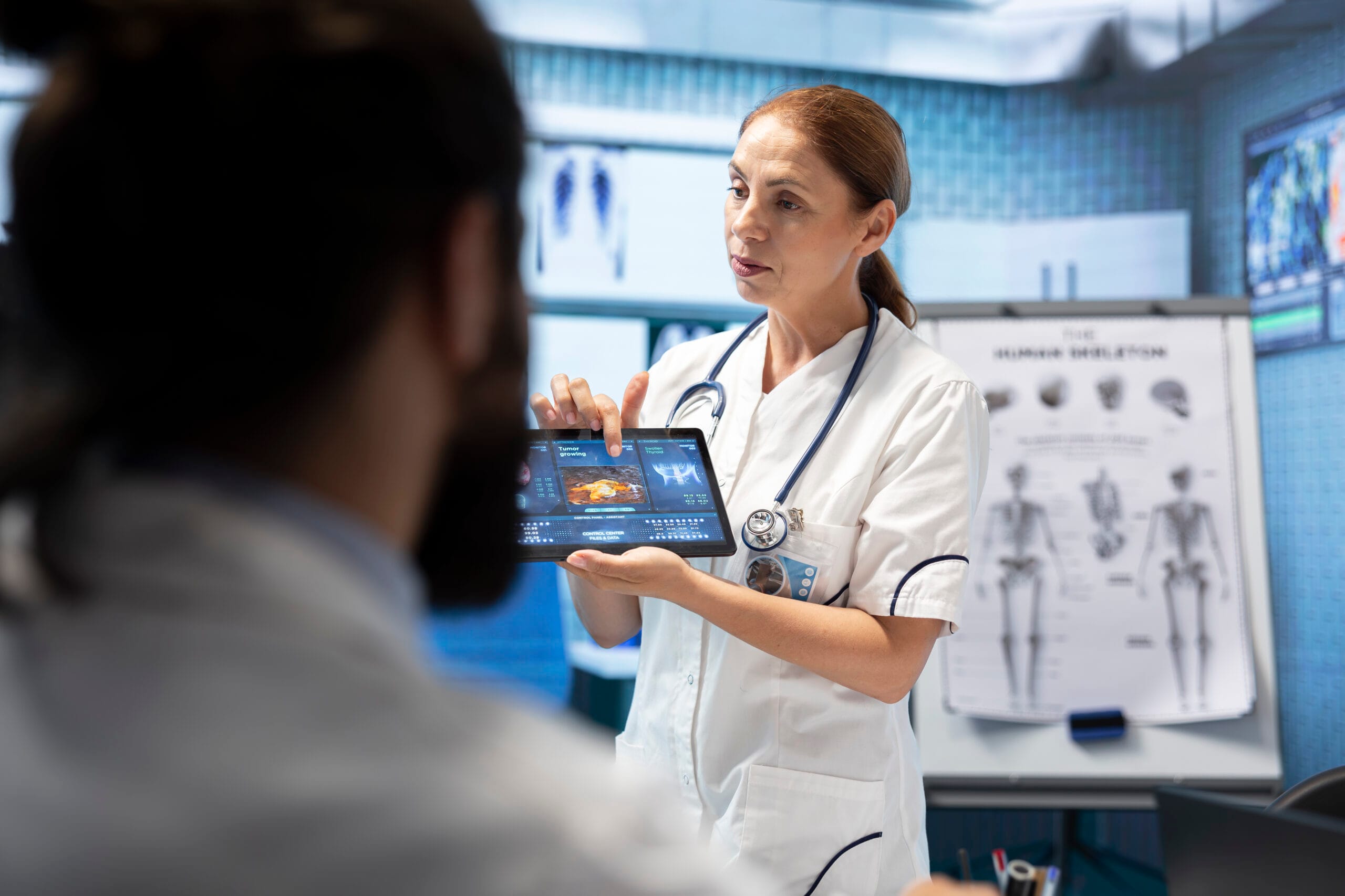 What Work Experience Do Medical Schools Prefer? doctor neurologist showing mri brain scan results her colleagues scaled
